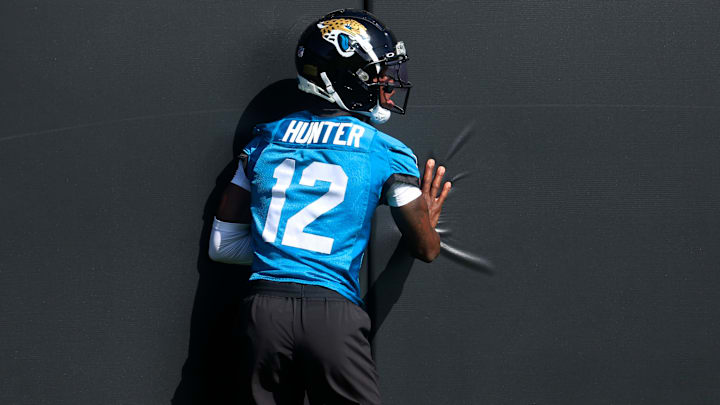 Jacksonville Jaguars wide receiver Travis Hunter (12) hits the padded wall after a sucessful reception during the second mandatory minicamp at Miller Electric Center Wednesday, June 11, 2025 in Jacksonville, Fla.