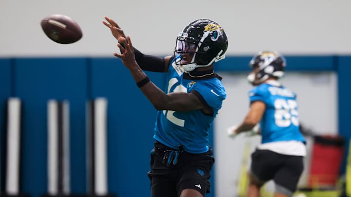 Jacksonville Jaguars wide receiver Travis Hunter (12) catches a pass during the 10th organized team activity at Miller Electric Center Wednesday, June 4, 2025 in Jacksonville, Fla. [Corey Perrine/Florida Times-Union]