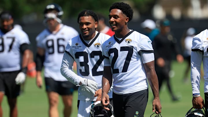 Jacksonville Jaguars cornerback Caleb Ransaw (27) smiles with safety Cam'Ron Silmon-Craig (32) during the second mandatory minicamp at Miller Electric Center Wednesday, June 11, 2025 in Jacksonville, Fla.