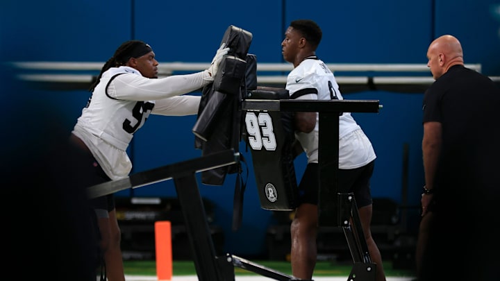 Jacksonville Jaguars defensive end Tyler Lacy (93), left, hits the sled against defensive tackle Maason Smith (94) during the second day of a mandatory minicamp Tuesday, June 11, 2024 at EverBank Stadium’s Miller Electric Center in Jacksonville, Fla. [Corey Perrine/Florida Times-Union]