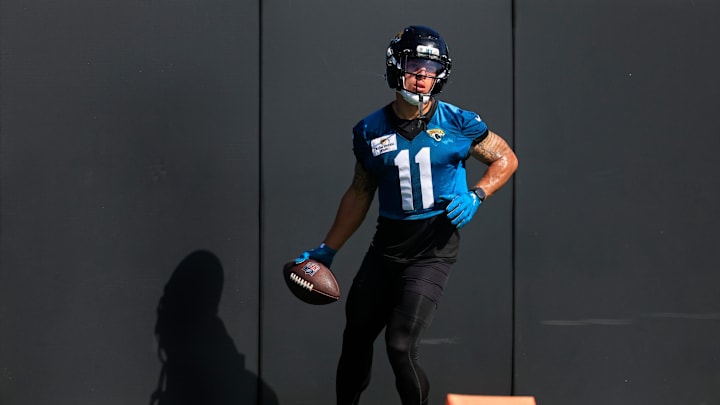 Jacksonville Jaguars wide receiver Parker Washington (11) turns after hitting a padded wall during the second mandatory minicamp at Miller Electric Center Wednesday, June 11, 2025 in Jacksonville, Fla.