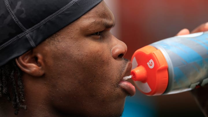 Jacksonville Jaguars wide receiver Travis Hunter (12) drinks water during a rookie minicamp at Miller Electric Center Saturday, May 10, 2025 in Jacksonville, Fla. [Corey Perrine/Florida Times-Union]