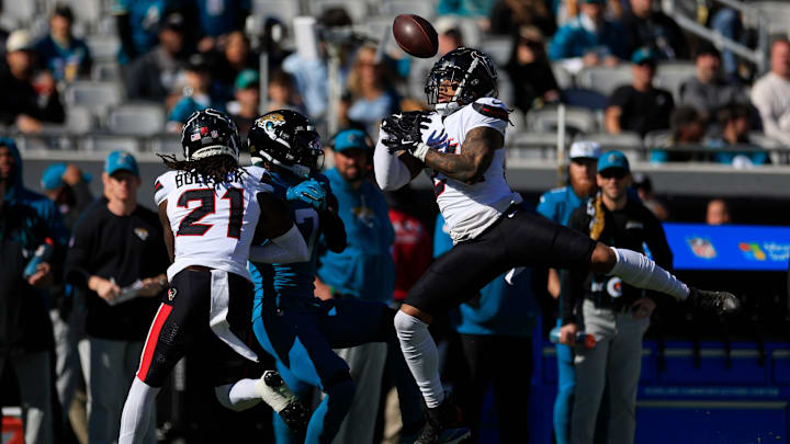 Houston Texans cornerback Derek Stingley Jr. (24) breaks up a pass intended for Jacksonville Jaguars wide receiver Brian Thomas Jr. (7) during the first quarter of an NFL football matchup Sunday, Dec. 1, 2024 at EverBank Stadium in Jacksonville, Fla. [Corey Perrine/Florida Times-Union]