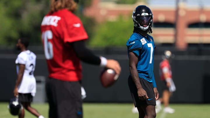 Jacksonville Jaguars wide receiver Brian Thomas Jr. (7) looks on to quarterback Trevor Lawrence (16) during the 10th organized team activity at Miller Electric Center Wednesday, June 4, 2025 in Jacksonville, Fla. [Corey Perrine/Florida Times-Union]