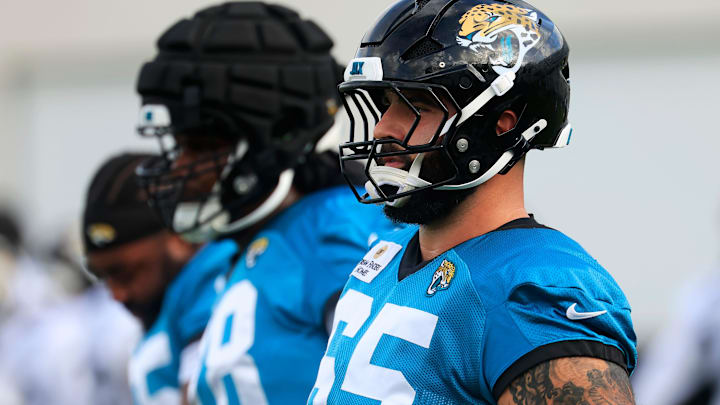 Jacksonville Jaguars guard Patrick Mekari (65) warms up during an NFL training camp session at the Miller Electric Center, Friday, July 25, 2025, in Jacksonville, Fla. [Corey Perrine/Florida Times-Union]