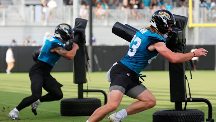 Jacksonville Jaguars wide receiver Trenton Irwin (83) drills on a practice dummy during an NFL training camp session at the Miller Electric Center, Friday, July 25, 2025, in Jacksonville, Fla. [Corey Perrine/Florida Times-Union]