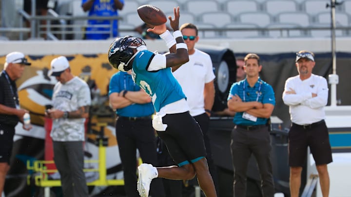 Jacksonville Jaguars wide receiver Travis Hunter (12) catches a pass during an NFL scrimmage event at EverBank Stadium, Friday, Aug. 1, 2025, in Jacksonville, Fla. [Corey Perrine/Florida Times-Union]