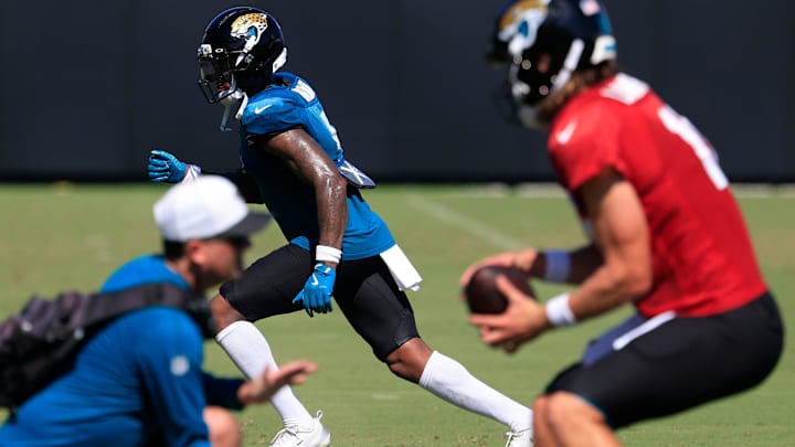 Jacksonville Jaguars wide receiver Dyami Brown (5) sprints before catching a pass from quarterback Trevor Lawrence (16) after an NFL training camp session at the Miller Electric Center, Wednesday, Aug. 6, 2025, in Jacksonville, Fla. [Corey Perrine/Florida Times-Union]