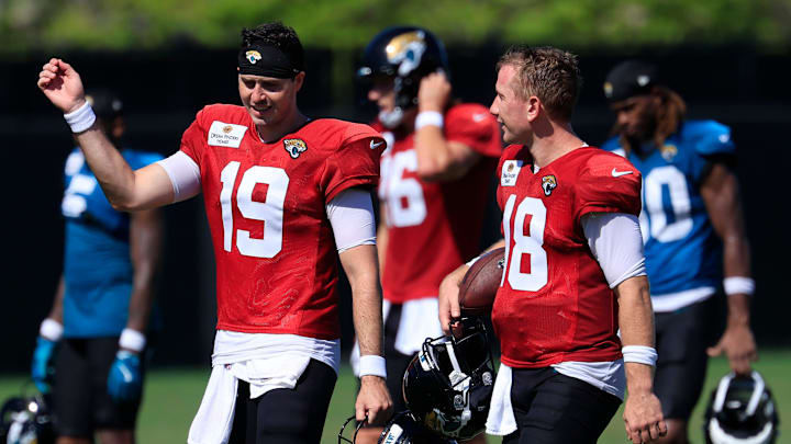 Jacksonville Jaguars quarterback Seth Henigan (19) walks with quarterback John Wolford (18) after an NFL training camp session at the Miller Electric Center, Wednesday, Aug. 6, 2025, in Jacksonville, Fla. [Corey Perrine/Florida Times-Union]