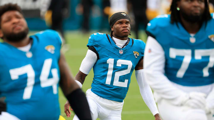 Jacksonville Jaguars wide receiver Travis Hunter (12) warms up before an NFL preseason matchup at EverBank Stadium, Saturday, Aug. 9, 2025 in Jacksonville, Fla. [Corey Perrine/Florida Times-Union]