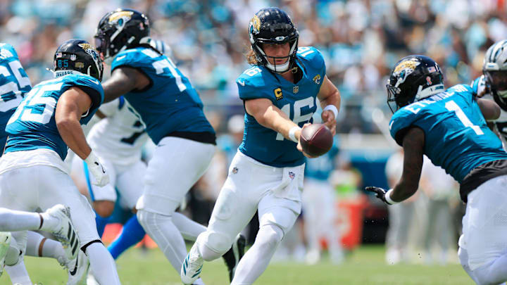 Jacksonville Jaguars quarterback Trevor Lawrence (16) hands off to running back Travis Etienne Jr. (1) during the first quarter of an NFL football matchup at EverBank Stadium, Sunday, Sept. 7, 2025 in Jacksonville, Fla. [Corey Perrine/Florida Times-Union]
