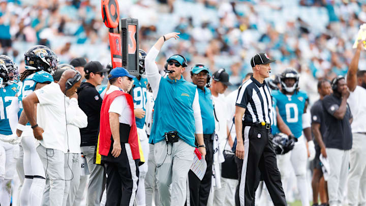 Sep 7, 2025; Jacksonville, Florida, USA; Jacksonville Jaguars head coach Liam Coen hypes up the crowd before a third down against the Carolina Panthers during the fourth quarter at EverBank Stadium. Mandatory Credit: Morgan Tencza-Imagn Images