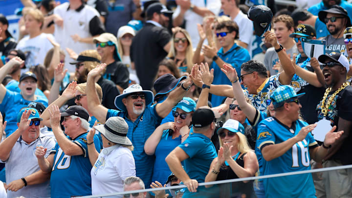 Jacksonville Jaguars high-five each other after a Houston Texans missed field goal during the first quarter of an NFL football matchup at EverBank Stadium, Sunday, Sept. 21, 2025, in Jacksonville, Fla. The Jaguars defeated the Texans 17-10.