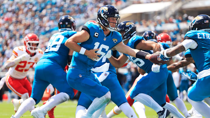 Jacksonville Jaguars quarterback Trevor Lawrence (16) hands off to running back Travis Etienne Jr. (1) during the first quarter of a NFL football game Sunday, Sept. 17, 2023 at EverBank Stadium in Jacksonville, Fla. The Kansas City Chiefs defeated the Jacksonville Jaguars 17-9. [Corey Perrine/Florida Times-Union]