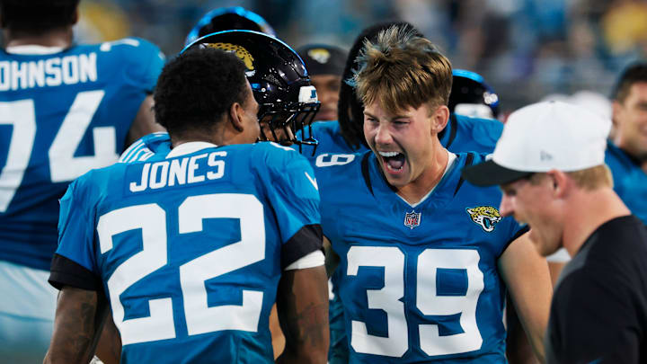 Jacksonville Jaguars place kicker Cam Little (39) celebrates his 70-yard field goal with cornerback Jarrian Jones (22) during the second quarter of an NFL preseason matchup at EverBank Stadium, Saturday, Aug. 9, 2025 in Jacksonville, Fla. [Corey Perrine/Florida Times-Union]