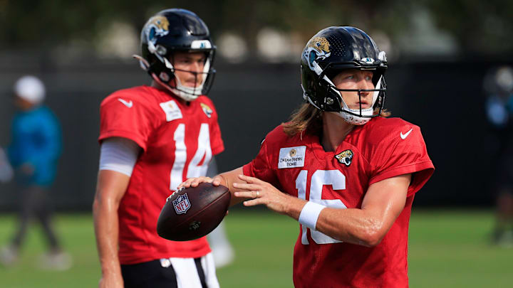 Jacksonville Jaguars quarterback Trevor Lawrence (16) looks to pass as quarterback Nick Mullens (14) looks on during an NFL training camp session at the Miller Electric Center, Thursday, Aug. 14, 2025 in Jacksonville, Fla. Jacksonville Jaguars quarterback Trevor Lawrence (16) looks to pass as quarterback Nick Mullens (14) looks on during an NFL training camp session at the Miller Electric Center, Thursday, Aug. 14, 2025 in Jacksonville, Fla.