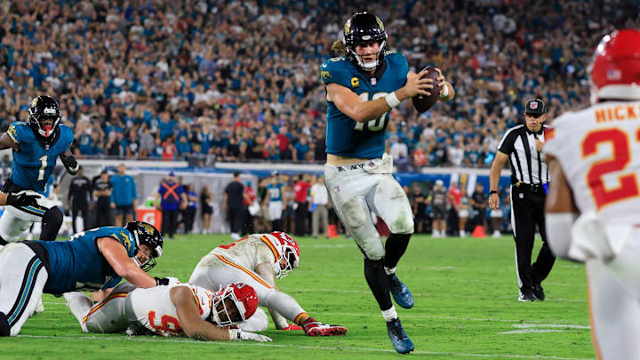 Jacksonville Jaguars wide receiver Travis Hunter (12) scrambles for a game-winning touchdown during the fourth quarter of an NFL football matchup at EverBank Stadium, Monday, Oct. 6, 2025, in Jacksonville, Fla. The Jacksonville Jaguars edged the Kansas City Chiefs 31-28. [Corey Perrine/Florida Times-Union]