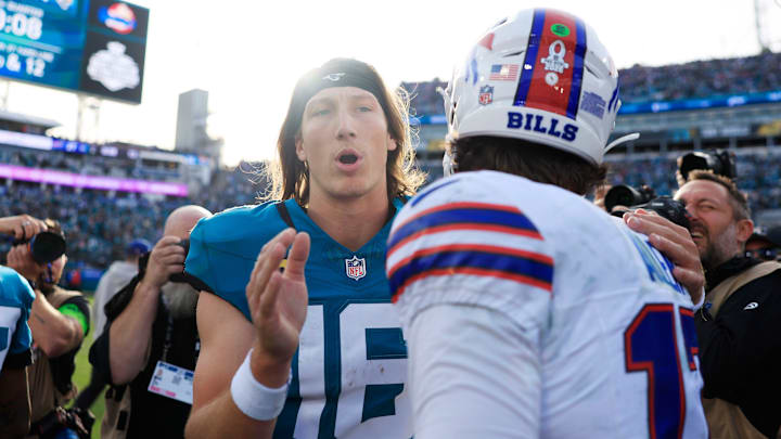 Jacksonville Jaguars quarterback Trevor Lawrence (16) greets Buffalo Bills quarterback Josh Allen (17) after the game of an NFL football AFC Wild Card playoff matchup, Sunday, Jan. 11, 2026, in Jacksonville, Fla. The Bills defeated the Jaguars 27-24. [Corey Perrine/Florida Times-Union]