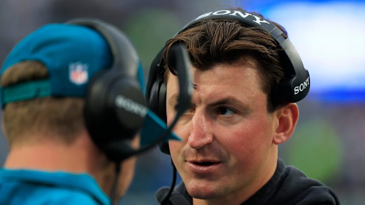 Jacksonville Jaguars offensive coordinator Grant Udinski looks on during the first quarter of an NFL football game at EverBank Stadium, Sunday, Dec. 7, 2025, in Jacksonville, Fla. The Jaguars defeated the Colts 36-19. Jacksonville Jaguars offensive coordinator Grant Udinski looks on during the first quarter of an NFL football game at EverBank Stadium, Sunday, Dec. 7, 2025, in Jacksonville, Fla. The Jaguars defeated the Colts 36-19.