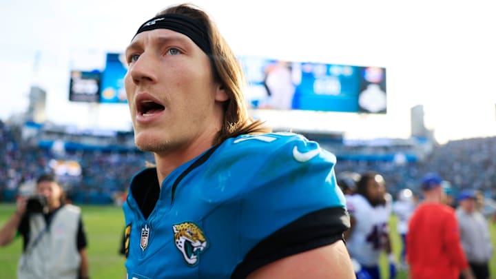 Jacksonville Jaguars quarterback Trevor Lawrence (16) looks to congratulate other Buffalo Bills players after the game of an NFL football AFC Wild Card playoff matchup, Sunday, Jan. 11, 2026, in Jacksonville, Fla. The Bills defeated the Jaguars 27-24. [Corey Perrine/Florida Times-Union]
