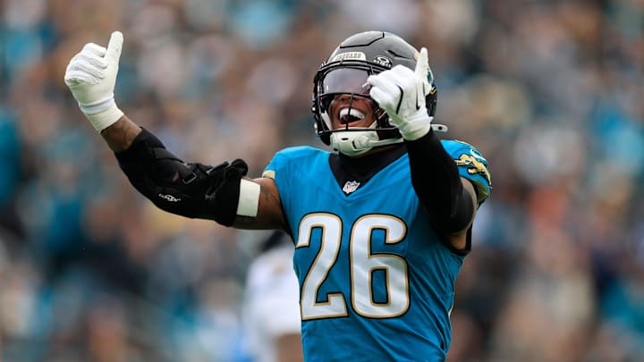 Jacksonville Jaguars safety Antonio Johnson (26) reacts to his tackle during the first quarter of an NFL football matchup at EverBank Stadium, Sunday, Jan. 4, 2026, in Jacksonville, Fla. The Jaguars defeated the Titans 41-7, capturing the AFC South title. [Corey Perrine/Florida Times-Union]