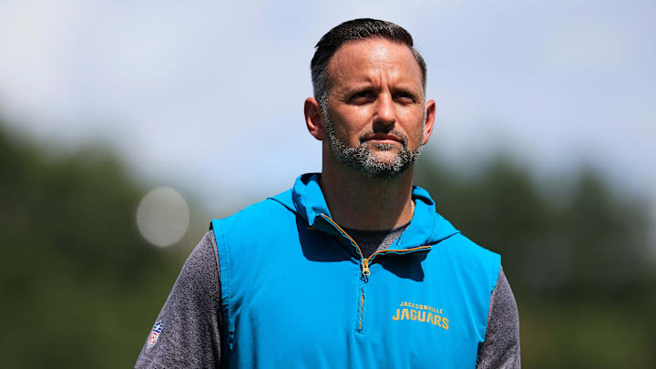 Jacksonville Jaguars defensive coordinator Anthony Campanile walks off the field to be interviewed by media members after an NFL training camp session at the Miller Electric Center, Thursday, Aug. 14, 2025 in Jacksonville, Fla. Jacksonville Jaguars defensive coordinator Anthony Campanile walks off the field to be interviewed by media members after an NFL training camp session at the Miller Electric Center, Thursday, Aug. 14, 2025 in Jacksonville, Fla.