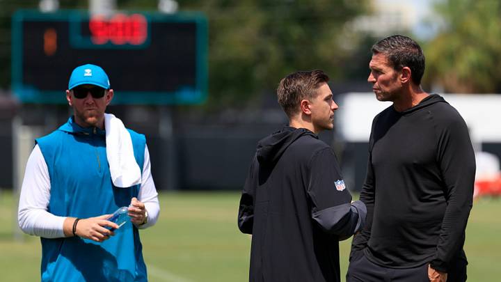 From left, Jacksonville Jaguars head coach Liam Coen, general manager James Gladstone and Tony Boselli, executive vice president of football operations, talk after an NFL training camp session at the Miller Electric Center, Thursday, Aug. 14, 2025 in Jacksonville, Fla.
