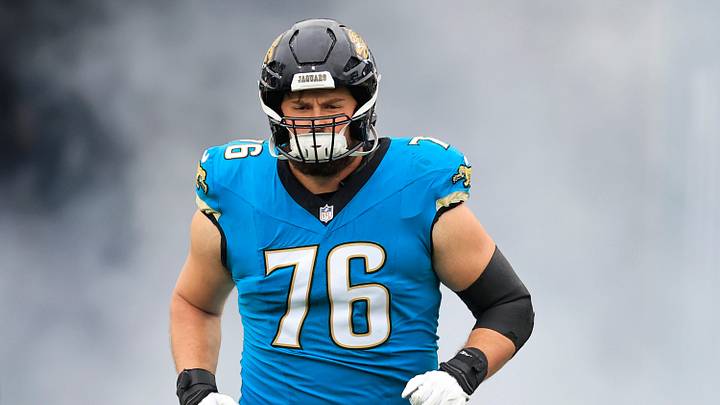 Jacksonville Jaguars guard Ezra Cleveland (76) runs on the field before an NFL football matchup at EverBank Stadium, Sunday, Jan. 4, 2026, in Jacksonville, Fla. The Jaguars defeated the Titans 41-7, capturing the AFC South title. [Corey Perrine/Florida Times-Union]