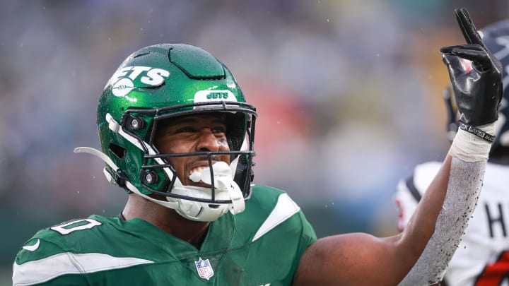 Dec 10, 2023; East Rutherford, New Jersey, USA; New York Jets running back Breece Hall (20) celebrates after a touchdown reception during the second half against the Houston Texans at MetLife Stadium. 