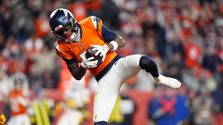 Dec 14, 2025; Denver, Colorado, USA: Denver Broncos wide receiver Troy Franklin (11) celebrates following a touchdown during the third quarter against the Green Bay Packers at Empower Field at Mile High. Mandatory Credit: Ron Chenoy-Imagn Images Dec 14, 2025; Denver, Colorado, USA: Denver Broncos wide receiver Troy Franklin (11) celebrates following a touchdown during the third quarter against the Green Bay Packers at Empower Field at Mile High. Mandatory Credit: Ron Chenoy-Imagn Images