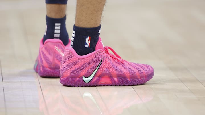 Memphis Grizzlies guard Ja Morant wears the Nike Ja 3 "Max Volume" colorway.