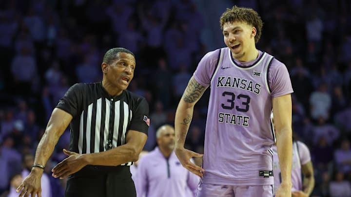 Feb 11, 2025; Manhattan, Kansas, USA; Kansas State Wildcats forward Coleman Hawkins (33) questions a call by an official during the second half against the Arizona Wildcats at Bramlage Coliseum. Mandatory Credit: Scott Sewell-Imagn Images