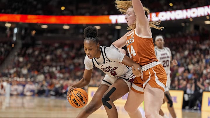 Mar 9, 2025; Greenville, SC, USA; South Carolina Gamecocks forward Joyce Edwards (8) tries to get around Texas Longhorns forward Taylor Jones (44) during the second half at Bon Secours Wellness Arena. Mandatory Credit: Jim Dedmon-Imagn Images Mar 9, 2025; Greenville, SC, USA; South Carolina Gamecocks forward Joyce Edwards (8) tries to get around Texas Longhorns forward Taylor Jones (44) during the second half at Bon Secours Wellness Arena. Mandatory Credit: Jim Dedmon-Imagn Images