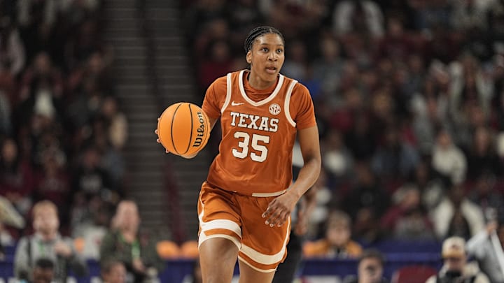 March 9, 2025; Greenville, SC, USA; Texas Longhorns forward Madison Booker (35) brings the ball up court against South Carolina Gamecocks during the first half at Bon Secours Wellness Arena. Mandatory Credit: Jim Dedmon-Imagn Images March 9, 2025; Greenville, SC, USA; Texas Longhorns forward Madison Booker (35) brings the ball up court against South Carolina Gamecocks during the first half at Bon Secours Wellness Arena. Mandatory Credit: Jim Dedmon-Imagn Images
