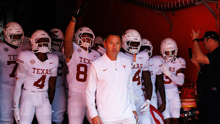 Texas Longhorns head coach Steve Sarkisian leads the team out of the tunnel before a game against the Florida Gators at Ben Hill Griffin Stadium.