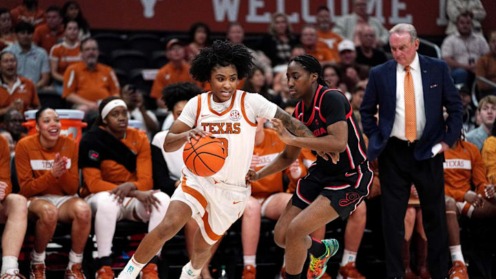 Feb 26, 2026; Austin, Texas, USA; Texas Longhorns guard Rori Harmon (3) drives the ball against Georgia Bulldogs guard Dani Carnegie (3) during the first quarter at Moody Center. Mandatory Credit: Dustin Safranek-Imagn Images