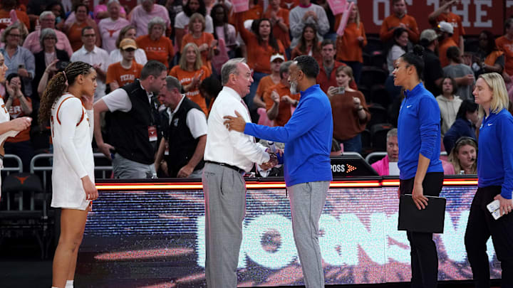 Feb 9, 2026; Austin, Texas, USA; Kentucky Wildcats head coach Kenny Brooks congratulates Texas Longhorns head coach Vic Schaefer on a 64-53 win after the game at Moody Center. Mandatory Credit: Dustin Safranek-Imagn Images