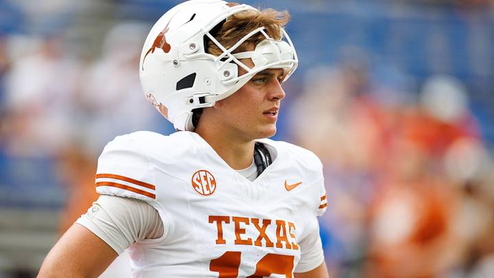 Texas Longhorns quarterback Arch Manning looks on before a game against the Florida Gators at Ben Hill Griffin Stadium. Texas Longhorns quarterback Arch Manning looks on before a game against the Florida Gators at Ben Hill Griffin Stadium.