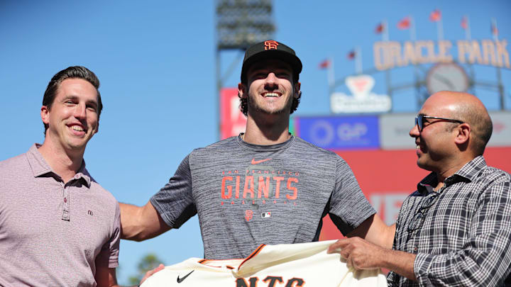 San Francisco Giants general manager Pete Putila, first round draft pick Bryce Eldridge, and president of baseball operations Farhan Zaidi pose for a photo before the game against the Oakland Athletics at Oracle Park in 2023.