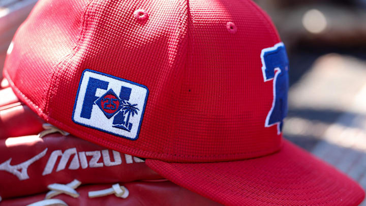 Philadelphia Phillies outfielder Gabriel Rincones Jr. (85) hat sits in the dugout against the Toronto Blue Jays in the fifth inning during spring training at TD Ballpark on Feb. 26.