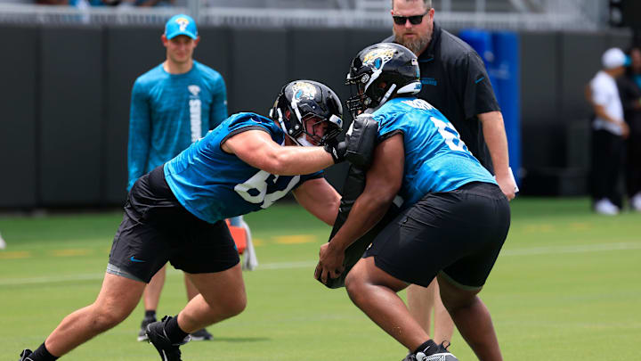 Jacksonville Jaguars guard Wyatt Milum (64), left, drills on guard Sal Wormley (61) during a rookie minicamp at Miller Electric Center Saturday, May 10, 2025 in Jacksonville, Fla. [Corey Perrine/Florida Times-Union]