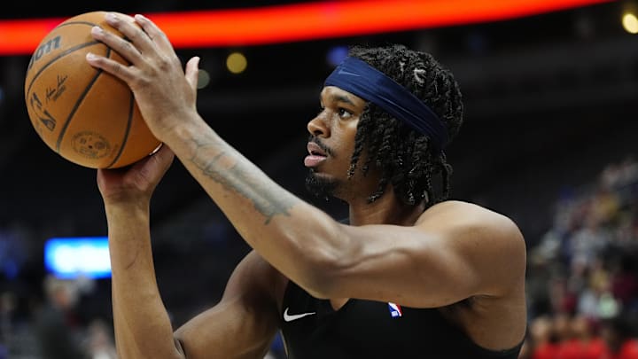 Jan 1, 2025; Denver, Colorado, USA; Denver Nuggets center DaRon Holmes II (14) warms up before the game against the Atlanta Hawks at Ball Arena. Jan 1, 2025; Denver, Colorado, USA; Denver Nuggets center DaRon Holmes II (14) warms up before the game against the Atlanta Hawks at Ball Arena.