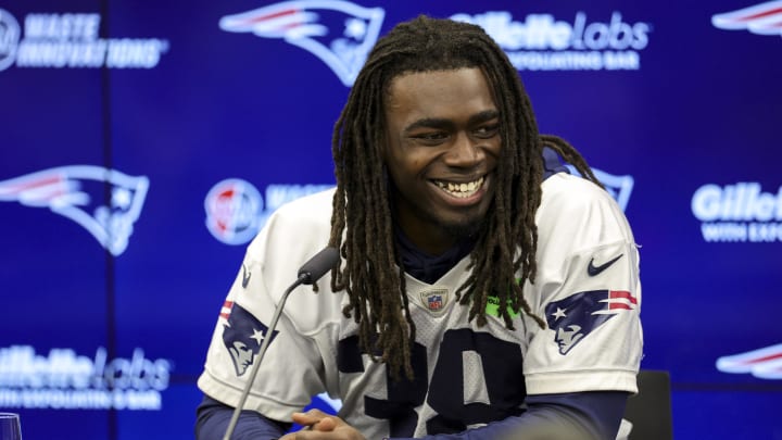 Nov 10, 2023; Frankfurt, Germany;  New England Patriots running back Rhamondre Stevenson (38) speaks to the media before an NFL International Series practice at the Deutcher Fussball-Bund facility. Mandatory Credit: Nathan Ray Seebeck-USA TODAY Sports