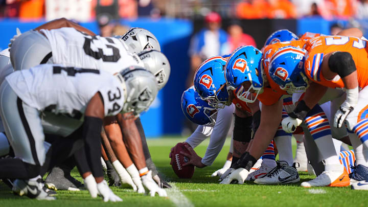 Oct 6, 2024; Denver, Colorado, USA; Members of the Las Vegas Raiders line up across from against the Denver Broncos in the second half at Empower Field at Mile High. Mandatory Credit: Ron Chenoy-Imagn Images