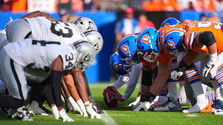 Oct 6, 2024; Denver, Colorado, USA; Members of the Las Vegas Raiders line up across from against the Denver Broncos in the second half at Empower Field at Mile High. Mandatory Credit: Ron Chenoy-Imagn Images