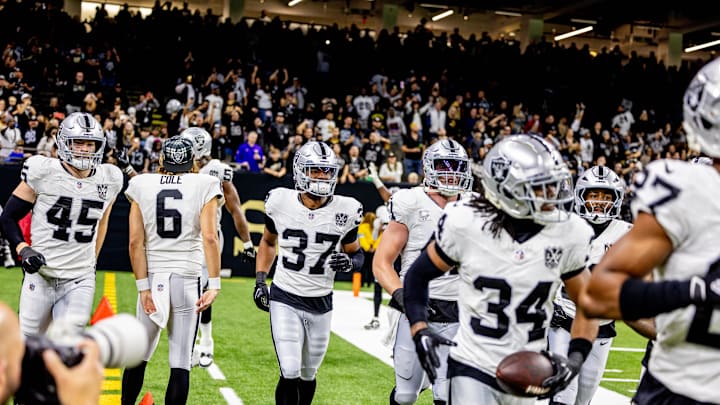Dec 29, 2024; New Orleans, Louisiana, USA; Las Vegas Raiders safety Thomas Harper (34) celebrates after an interception against the New Orleans Saints during the second half at Caesars Superdome. Mandatory Credit: Stephen Lew-Imagn Images Dec 29, 2024; New Orleans, Louisiana, USA; Las Vegas Raiders safety Thomas Harper (34) celebrates after an interception against the New Orleans Saints during the second half at Caesars Superdome. Mandatory Credit: Stephen Lew-Imagn Images