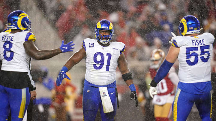 Dec 12, 2024; Santa Clara, California, USA; Los Angeles Rams defensive tackle Kobie Turner (91) reacts after recording a sack against the San Francisco 49ers in the second quarter at Levi's Stadium. Mandatory Credit: Cary Edmondson-Imagn Images