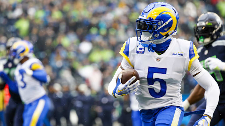 Jan 8, 2023; Seattle, Washington, USA; Los Angeles Rams cornerback Jalen Ramsey (5) returns an interception against the Seattle Seahawks during the first quarter at Lumen Field. Mandatory Credit: Joe Nicholson-Imagn Images Jan 8, 2023; Seattle, Washington, USA; Los Angeles Rams cornerback Jalen Ramsey (5) returns an interception against the Seattle Seahawks during the first quarter at Lumen Field. Mandatory Credit: Joe Nicholson-Imagn Images
