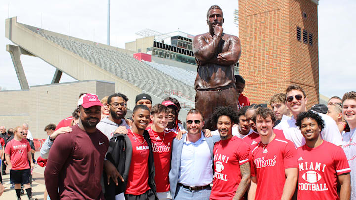 Sean McVay poses with current Miami football players in front of his new statue. Los Angeles Rams head football coach Sean McVay became the 10th coach to have a statue in Miami University's prestigious Cradle of Coaches Plaza May 6, 2023. McVay was a former player at Miami and has been coaching in the NFL since 2009.  He became the youngest head coach in NFL history to win a Super Bowl (36) when the Rams beat the Bengals in 2022.