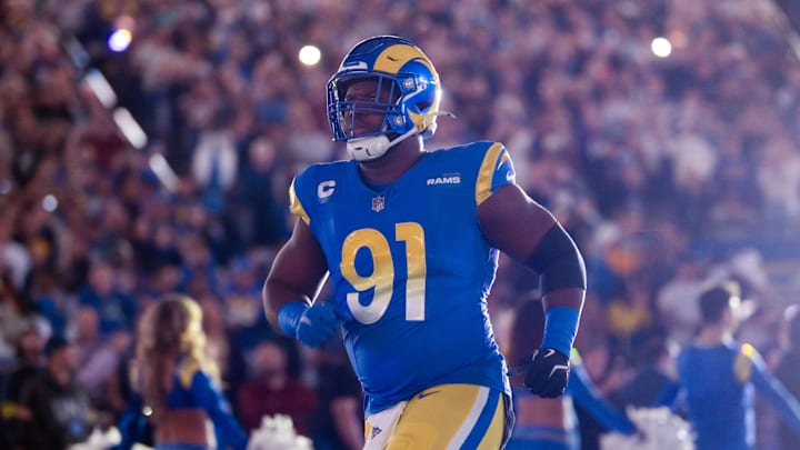 Jan 13, 2025; Glendale, AZ, USA; Los Angeles Rams defensive tackle Kobie Turner (91) against the Minnesota Vikings during an NFC wild card game at State Farm Stadium. Mandatory Credit: Mark J. Rebilas-Imagn Images